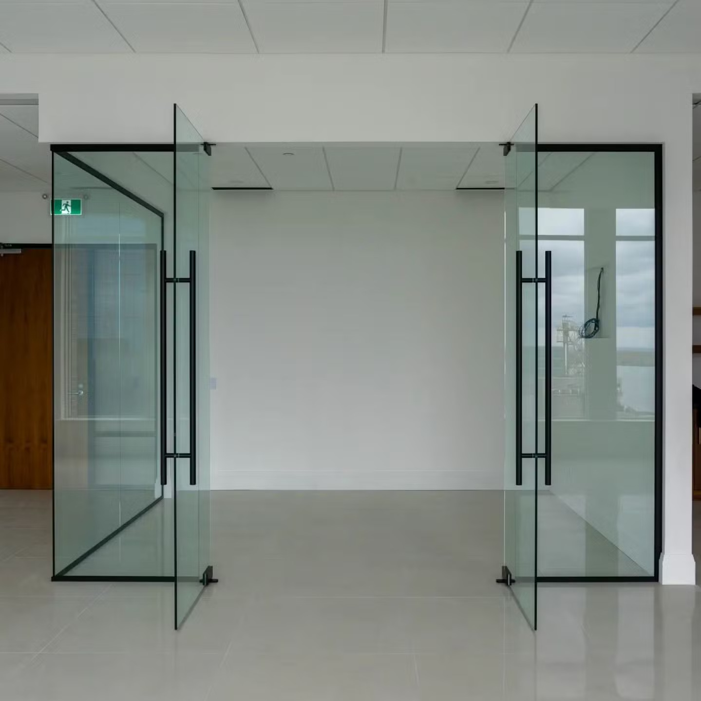 Glass Partition 29 Frameless glass office partition double doors