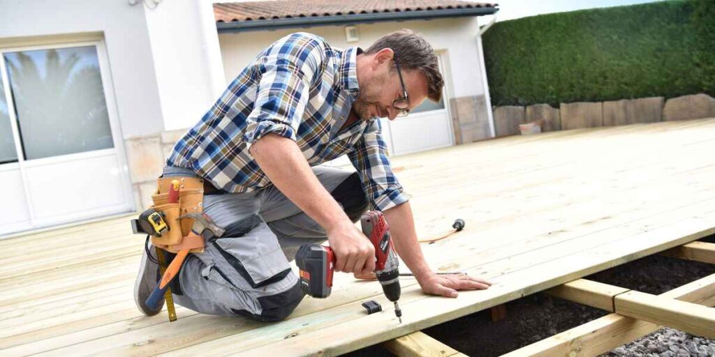 A Man Working On Garden Carpentry Project