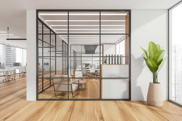 Modern glass walled office meeting room