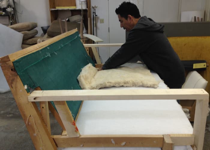 A man Repairing Sofa