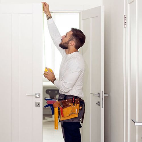 Our Expert inspecting Door After Installation