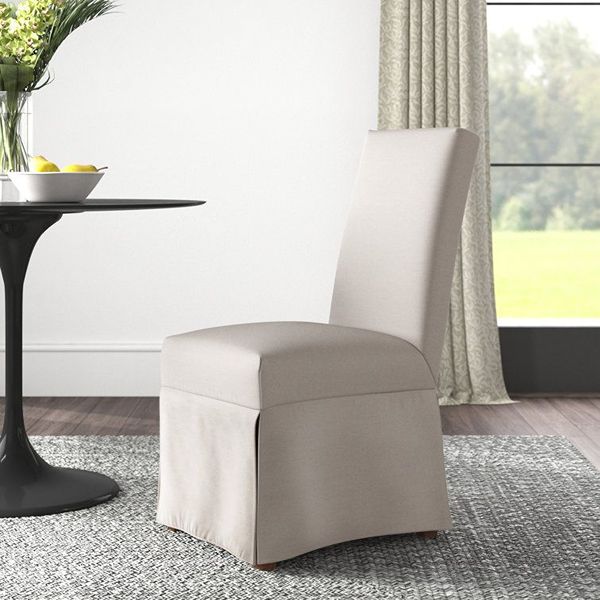 White slipcovered lounge chair